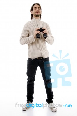 Smiling Male Holding Binocular Stock Photo