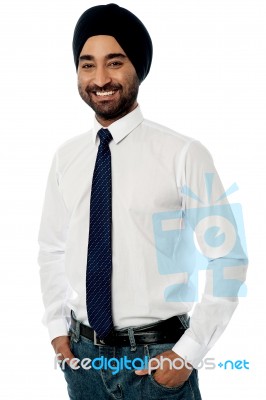 Smiling Male Manager Posing Casually Stock Photo