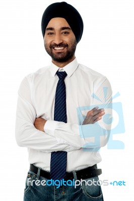 Smiling Male Manager Posing Casually Stock Photo