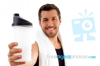 Smiling Male Showing Water Bottle Stock Photo