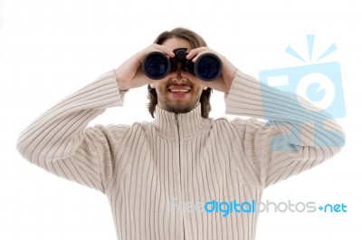 Smiling  Male Watching Through Binocular Stock Photo