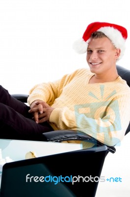 Smiling Male Wearing Christmas Hat Stock Photo