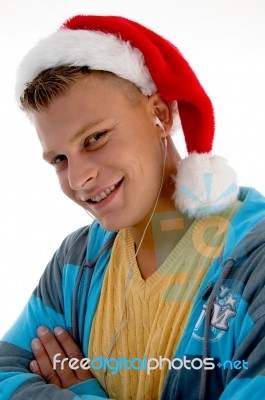 Smiling Male Wearing Santa Hat Stock Photo