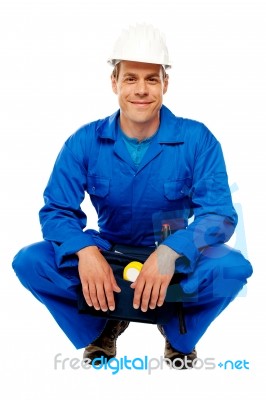 Smiling Male Worker Wearing Helmet Stock Photo