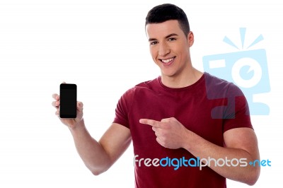 Smiling Man Displaying His Mobile Phone Stock Photo