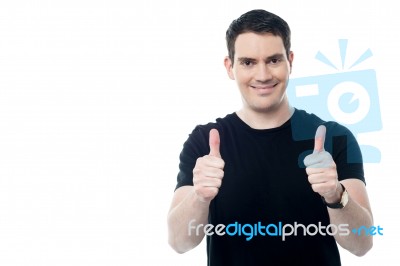 Smiling Man Giving Best Wishes Stock Photo