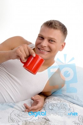 Smiling Man Having Coffee Stock Photo