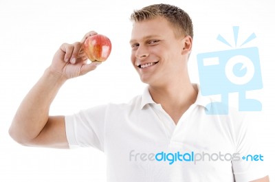 Smiling Man Holding Apple Stock Photo