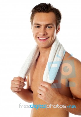 Smiling Man Holding Gym Towel Stock Photo