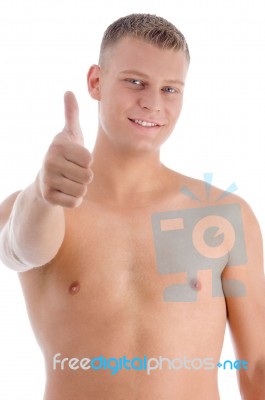 Smiling Man Showing Thumbs Up Stock Photo