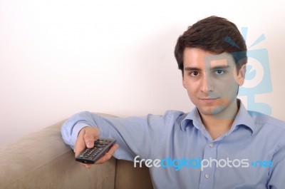 Smiling Man Watching Tv Stock Photo