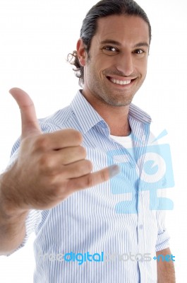 Smiling Man With Hand Gesture Stock Photo