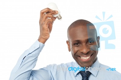 Smiling Man With Lamp, Idea Concept Stock Photo