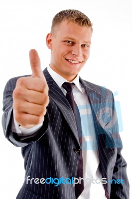 Smiling Manager Showing Thumb Up Stock Photo