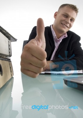 Smiling Manager Shows Approval Sign Stock Photo