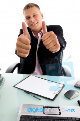 Smiling Manager Shows Approval Sign Stock Photo