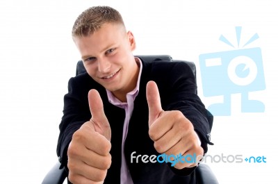 Smiling Manager Shows Approval Sign Stock Photo