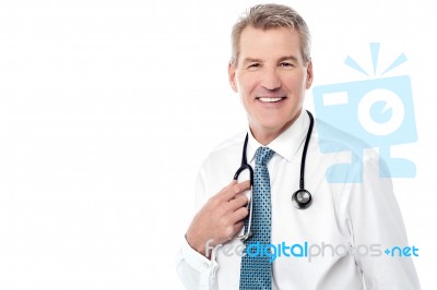 Smiling Mature Doctor Isolated On White Stock Photo