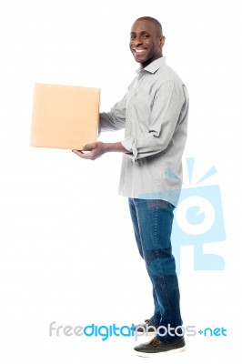 Smiling Middle Aged Delivery Man Stock Photo