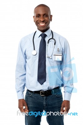 Smiling Middle Aged Doctor Posing Stock Photo