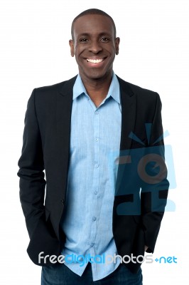 Smiling Middle Aged Executive Looking At Camera Stock Photo