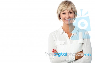 Smiling Middle Aged Lady, Arms Crossed Stock Photo