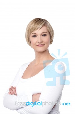 Smiling Middle Aged Lady, Arms Crossed Stock Photo