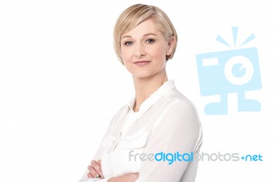Smiling Middle Aged Lady, Crossed Arms Stock Photo