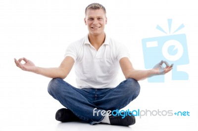 Smiling Model In Yoga Posture Stock Photo