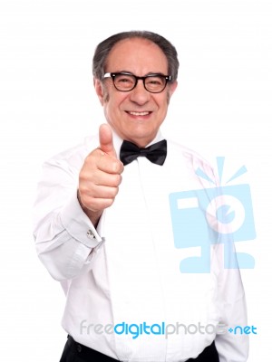 Smiling Old Man Gesturing Thumbs Up Stock Photo