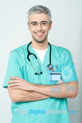 Smiling Physician, Arms Crossed Stock Photo