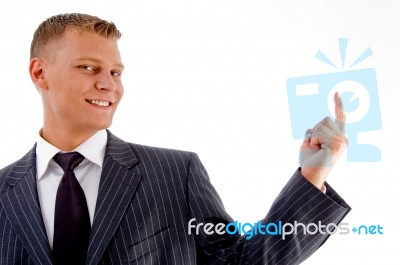 Smiling Pointing Businessman Stock Photo