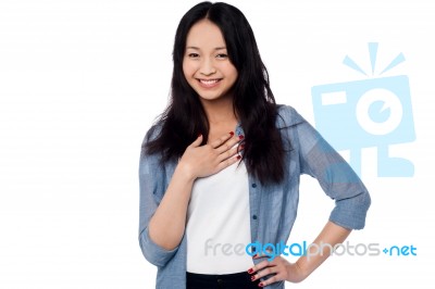 Smiling Portrait Of An Attractive Asian Model Stock Photo