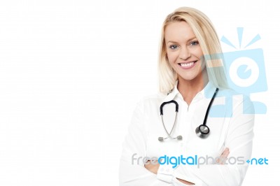 Smiling Pretty Doctor Posing Over White Stock Photo