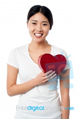 Smiling Pretty Girl With Love Heart Stock Photo