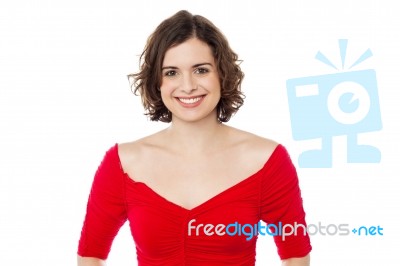 Smiling Pretty Woman In Fashionable Red Top Stock Photo