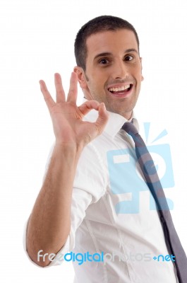 Smiling Professional Man Showing Ok Gesture Stock Photo