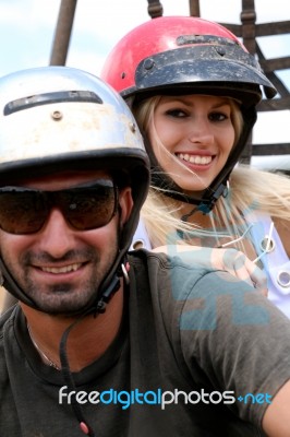 Smiling Riders Wearing Helmet Stock Photo