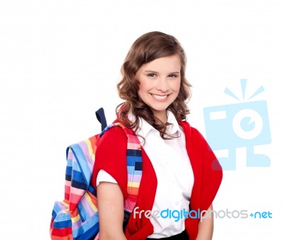 Smiling School Girl Carrying Bag  Stock Photo