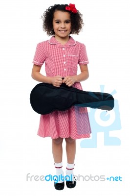 Smiling School Girl With Guitar Stock Photo