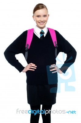 Smiling Schoolgirl Posing With Confidence Stock Photo