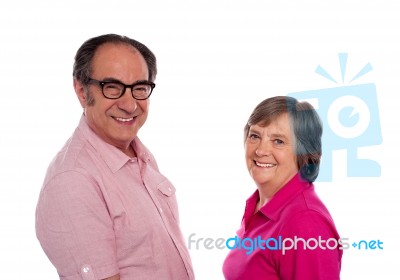 Smiling Senior Couple On White Stock Photo