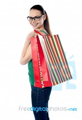 Smiling Shopping Lady Walking Stock Photo