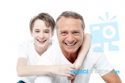 Smiling Shot Of A Father And Son Stock Photo