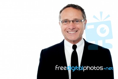 Smiling Smart Senior Businessman Stock Photo