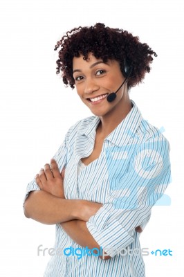 Smiling Woman In Hands Free Headset Device Stock Photo