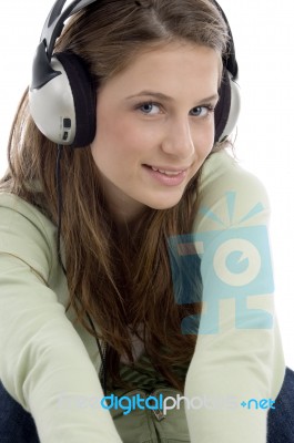 Smiling Woman Listening To Music Stock Photo