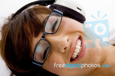 Smiling Woman Listening To Music Stock Photo