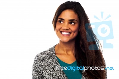 Smiling Woman Looking Outside Stock Photo