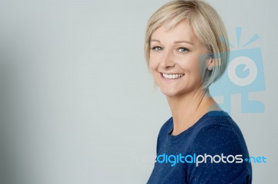 Smiling Woman Posing In Casuals Stock Photo